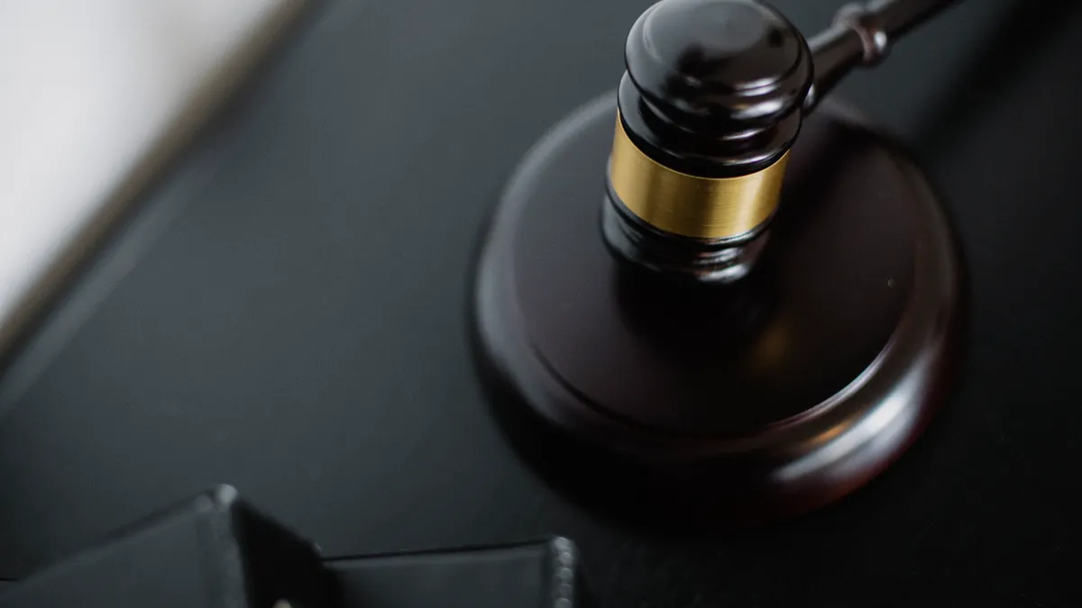 What U.S. Tech Companies Need to Know About AI Regulation Close-up of a judge's gavel on a dark desk